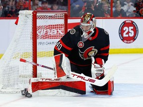 Ottawa Senators goaltender Mads Sogaard (40) makes a save against the Chicago Blackhawks during second period NHL action at the Canadian Tire Centre on Friday, Feb. 17, 2023.