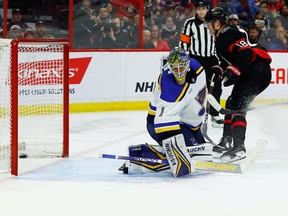 Ottawa Senators left wing Tim Stützle (18) scores his second goal of the game against St. Louis Blues goaltender Thomas Greiss (1) during third period NHL action at the Canadian Tire Centre on Sunday, Feb. 19, 2023.