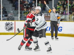 Will Gerrior of the Ottawa 67’s battles for position with Olivier Boutin of the Gatineau Olympiques at the Arena at TD Place Thursday.  (Photo by Valerie Wutti/OSEG)