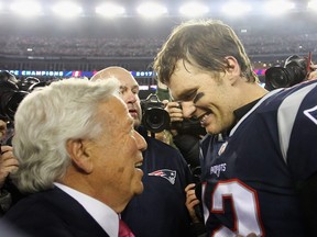 Tom Brady #12 of the New England Patriots celebrates with owner Robert Kraft after winning the AFC Championship Game against the Jacksonville Jaguars at Gillette Stadium on January 21, 2018 in Foxborough, Massachusetts.