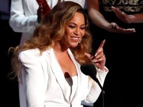 Beyonce reacts after winning the entertainer of the year award at the 50th NAACP Image Awards in Los Angeles, March 30, 2019.