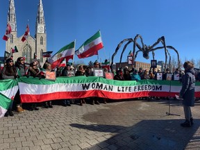 About 300 people rallied in front of the National Gallery of Canada in Ottawa Saturday in a demonstration against the Iranian regime. The "Women Life Freedom" demonstration was one of many around the world marking the 44th anniversary of the 1979 Iranian Revolution.