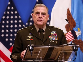 U.S. Chairman of the Joint Chiefs of Staff General Mark A. Milley looks on as he attends a news conference on the day of the NATO defence ministers' meeting at the Alliance's headquarters in Brussels, Belgium, February 14, 2023.
