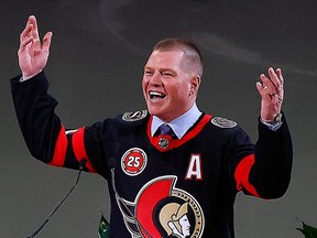 Chris Neil's No. 25 was raised to the rafters of the Canadian Tire Centre before Friday's home game against the Chicago Blackhawks.