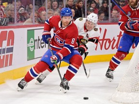 Senators captain Brady Tkachuk (7) forechecks against Canadiens defenceman Mike Matheson during the first period of Saturday's game at Montreal.