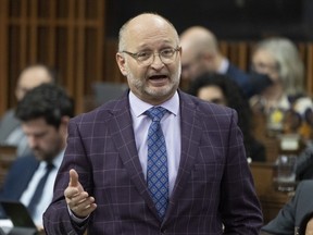 Minister of Justice and Attorney General of Canada David Lametti rises during Question Period in Ottawa, Tuesday, Feb. 7, 2023.