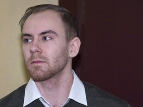 William Sandeson arrives at his preliminary hearing at provincial court in Halifax, Feb. 23, 2016. A legal battle is brewing in Nova Scotia over access to bitcoin owned by an ex-medical student recently convicted of fatally shooting a fellow student during a drug deal and disposing of his body.