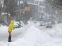 A resident of Ottawa is removed during a snowstorm.