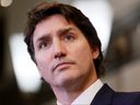 Perdana Menteri Justin Trudeau mengambil bagian dalam konferensi pers di Parliament Hill di Ottawa, 17 Februari 2023.