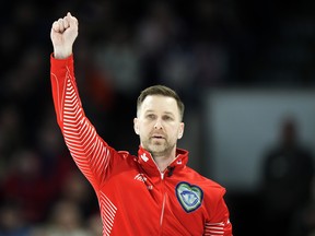 Team Canada's Brad Gushue reacts after making a three against Team Manitoba in the eighth end during the finals at the 2023 Tim Hortons Brier in London, Ont., Sunday, March 12, 2023.