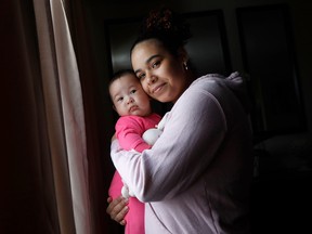 Jessica Kiala with her daughter Deborah at their home in Ottawa.