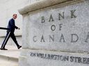 Bank of Canada Governor Tiff McCrem walks outside the Bank of Canada building in Ottawa on June 22, 2020.