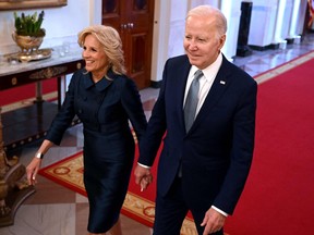 First Lady Jill Biden and U.S. President Joe Biden arrive at a White House ceremony honouring recipients of the National Humanities Medals and the National Medals of Arts on Tuesday.