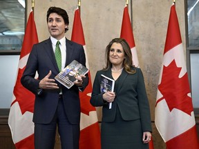 Prime Minister Justin Trudeau and Deputy Prime Minister and Minister of Finance Chrystia Freeland arrive to deliver the federal budget in the House of Commons on Parliament Hill in Ottawa, Tuesday, March 28, 2023.