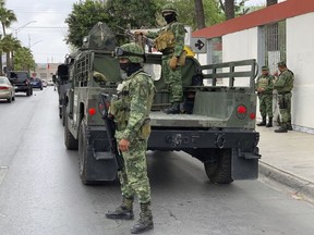 Mexican army soldiers prepare a search mission for four U.S. citizens kidnapped by gunmen in Matamoros, Mexico, Monday, March 6, 2023.