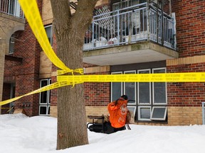 A burnt wheelchair sits outside 310 Wiggins Private in Ottawa after an overnight fire following which a 67-year-old woman died.