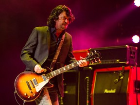 The Tragically Hip's guitarist, Paul Langlois, performs on stage at Rogers Arena in Vancouver, Feb. 2015.