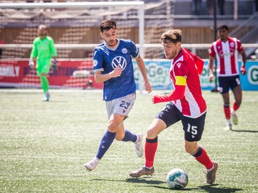 Atlético Ottawa host the Halifax Wanderers for their home opener at a TD Place Saturday, April 15, 2023. The pay what you can event was also a fundraiser for the CHEO Foundation. Halifax's Riley Alexander Ferrazzo (23) tries to get the ball from Ottawa's Maxim Tissot (15).