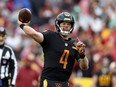 Washington Commanders quarterback Taylor Heinicke throws a second half pass against the Atlanta Falcons at FedExField, Nov. 27, 2022 in Landover, Maryland.