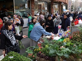 Iranian women shop at the Tajrish Bazaar ahead of Nowruz, the Iranian New Year, in Tehran, Iran, March 15, 2023.