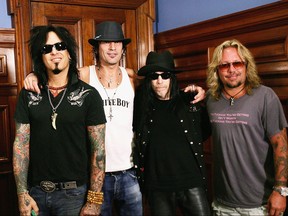 From left to right: Nikki Sixx, Tommy Lee, Mick Mars and Vince Neil of Motley Crue pose before a press conference to promote their Australian tour at the Intercontinental Hotel on Dec. 2, 2005 in Sydney, Australia.