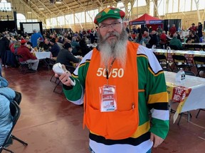 Volunteer Chris Armstrong is part of the colourful scene, selling 50/50 tickets at the 2023 world men’s curling championship in Ottawa, while also wearing the colours of the City View Curling Club.