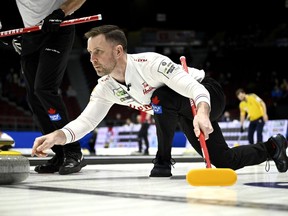 Canada skip Brad Gushue delivers a throw as they take on Germany at the Men's World Curling Championship in Ottawa, on Thursday, April 6, 2023.