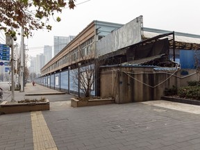 The Huanan Seafood Market surrounded by barriers in Wuhan in Feb. 2023.