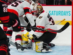 Ottawa Senators goaltender Leevi Merilainen makes a save against the Carolina Hurricanes during the first period at PNC Arena on Tuesday night.