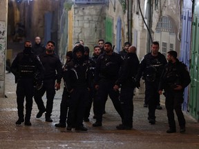 Israeli police forces deploy in the Old City in annexed east Jerusalem after a reported shooting incident on April 1, 2023