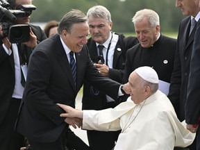 Pope Francis arrives meeting Quebec Premier François Legault during his papal visit across Canada in Quebec City on Wednesday, July 27, 2022.