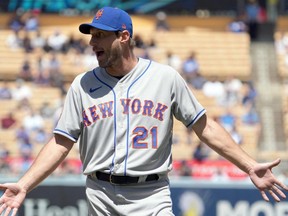 New York Mets starting pitcher Max Scherzer (21) reacts after being ejected during the game against the Los Angeles Dodgers at Dodger Stadium on Wednesday.