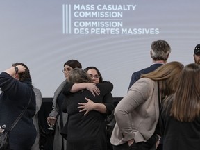 Family, friends and supporters of the victims of the mass killings in rural Nova Scotia in 2020 gather following the release of the Mass Casualty Commission inquiry's final report in Truro, N.S. on Thursday, March 30, 2023.