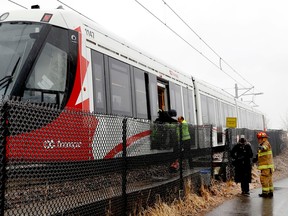 Ottawa's LRT shut down due to a 'power issue' last week as a freezing rain storm hit the capital. Ottawa firefighters and Ottawa police cut a hole in the fence near Lees station to help get riders off the train.