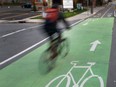 New camera technology installed along sections of the O'Connor Street bike lanes in Ottawa Ontario Monday Oct. 16, 2017. The cameras will detect the motion of cyclists approaching the intersection, send that information to computers stored in protected casings on nearby hydro poles and activate nine LED lights which will begin flashing to alert approaching motorists.   Tony Caldwell