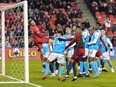 Toronto FC forward Federico Bernardeschi (not shown) scores on Charlotte FC goalkeeper George Marks (31) during first half MLS soccer action in Toronto, on Saturday, April 1, 2023.