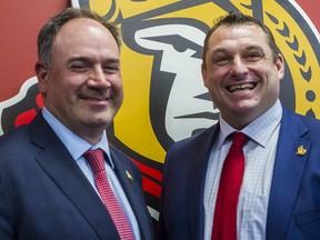 Ottawa Senators general manager Pierre Dorion (left) and head coach D.J. Smith.