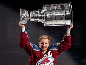 Gabriel Landeskog of the Colorado Avalanche skates with the Stanley Cup at a ceremony in 2022.