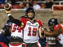 File photo/ Ottawa Redblacks quarterback Nick Arbuckle (19) passes across field against the Montreal Alouettes during 1st half CFL action at Percival Molson Stadium in Montreal on Friday September 2, 2022.