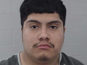 This photo released by the Keene Police Department on Sunday, May 14, 2023, shows Angel Gomez. Gomez and a 12-year-old boy have been arrested on murder warrants in the fatal shooting of a Sonic Drive-In employee in Keene, Texas.