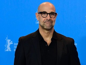 Stanley Tucci poses for photographers during a photocall for the film "Final Portrait" out of competition at the 67th Berlinale film festival in Berlin, Feb. 11, 2017.