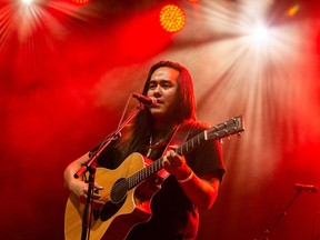 Indigenous singer-songwriter Aysanabee on stage at Bluesfest, 2021.