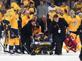 In October 2022, the Nashville Predators’ Mark Borowiecki is stretchered off the ice after suffering an upper-body injury during a game against the Philadelphia Flyers.