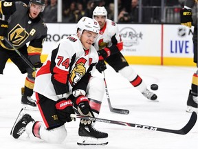 Mark Borowiecki drops to one knee as he attempts to block a shot against the Vegas Golden Knights during an October 2019 game. Borowiecki suited up for 375 games with the Senators over nine seasons.
