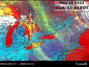 A satellite photo taken Wednesday shows the path of smoke particles from Alberta wildfires through Ontario.