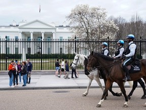 U.S. Park Police patrol Lafayette Square on horseback near the White House in Washington, D.C., U.S., February 23, 2023.