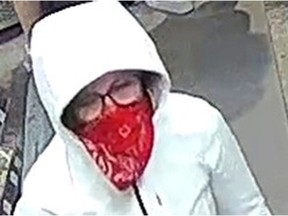 Ottawa police are looking to identify two suspects in an April 14 robbery on Laurier Avenue East.
