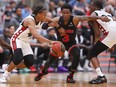 Ottawa Blackjacks' Cadre Gray drives around Calgary Surge's Stefan Smith.