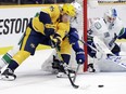 Nashville Predators centre Matt Duchene (95) closes in on Vancouver Canucks goaltender Jacob Markstrom.