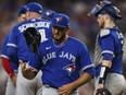 Blue Jays pitcher Yimi Garcia walks off the field in the seventh inning against the Rangers at Globe Life Field in Arlington, Texas, Saturday, June 17, 2023.